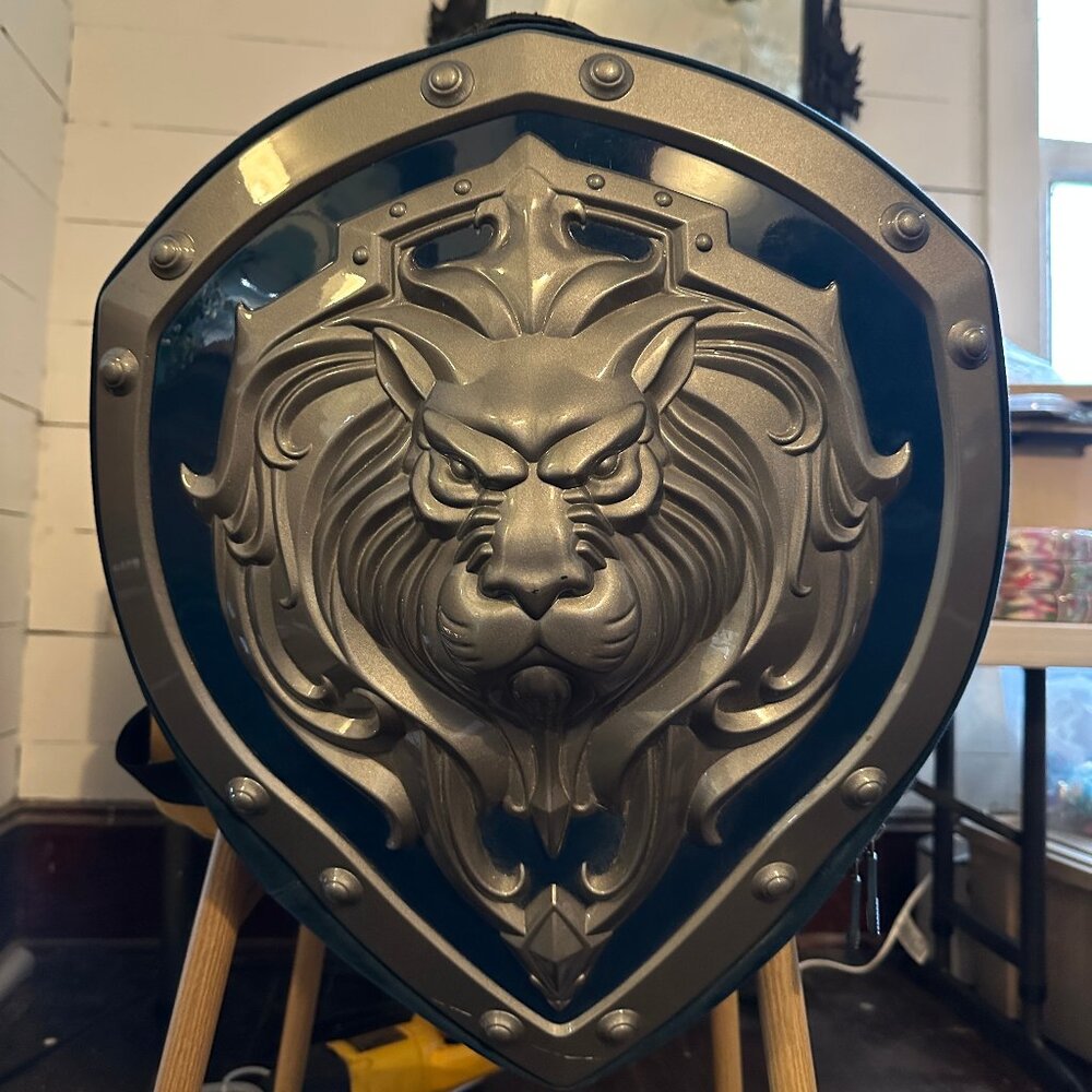 Lion Shield Sculpted Backpack in Metallic Gray